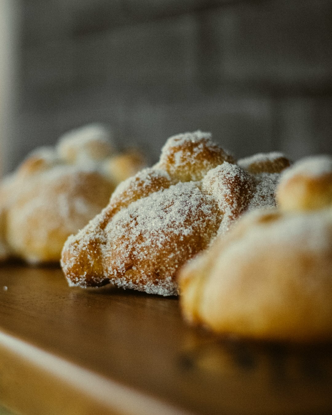 Freshly baked sweet Czech buchty pastries dusted with powdered sugar