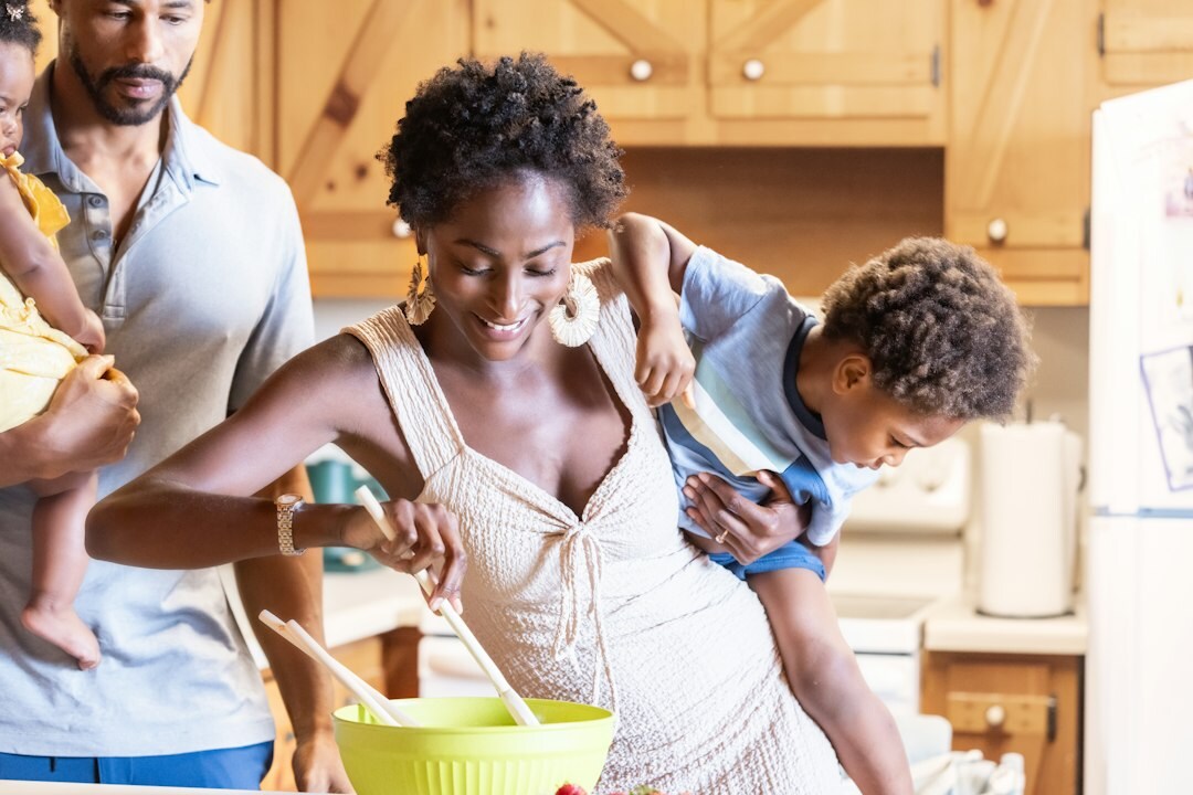 mother cooking with children